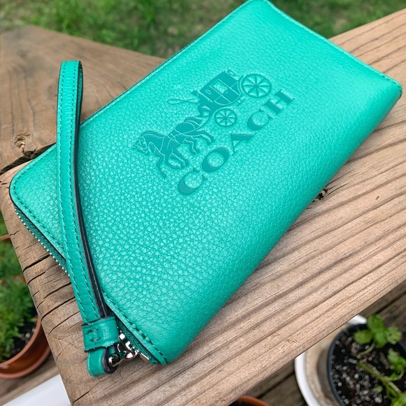 Coach Handbags - Authentic Coach leather logo zip Lg Wristlet/Phone